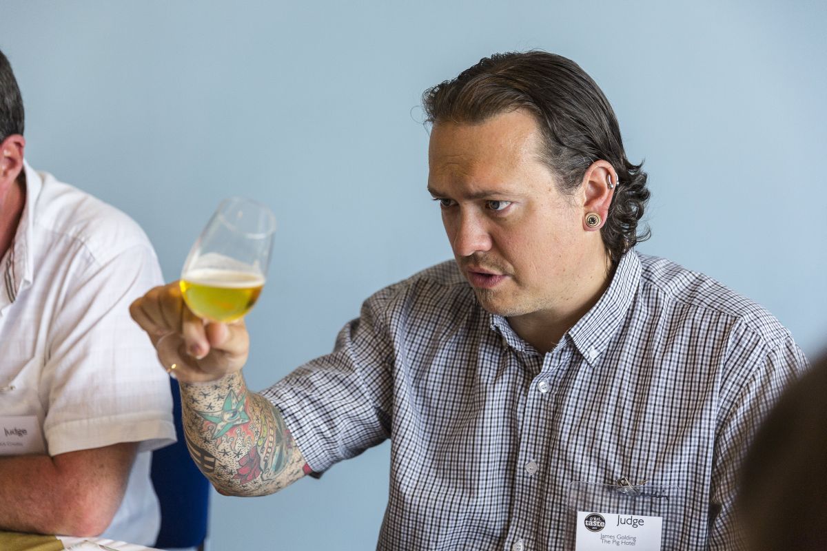 James Golding, The Pigs Chef Director, admiring cider at the Great Taste Awards 2015