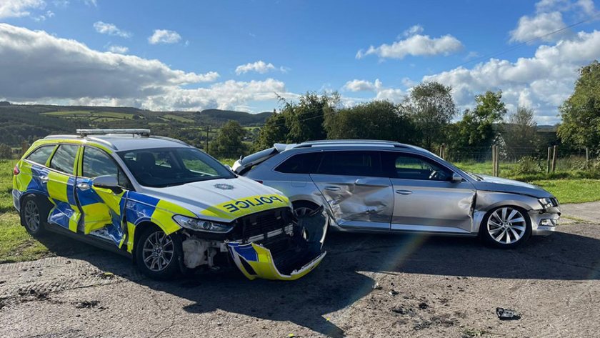 A man in his 20s rammed three police vehicles with a tractor, causing 'extensive damage' (Photo: PSNI)