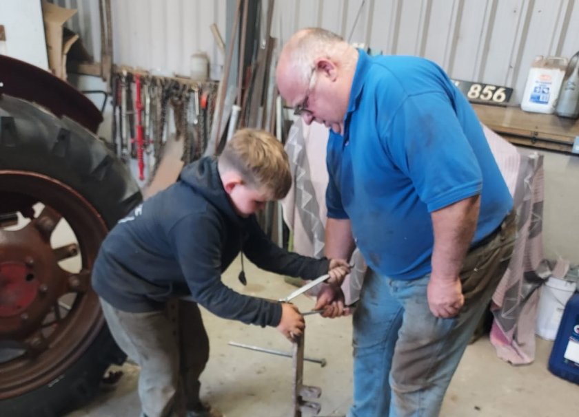 Buddy and his grandad Steve Lyne restored the 1940s-era tractor