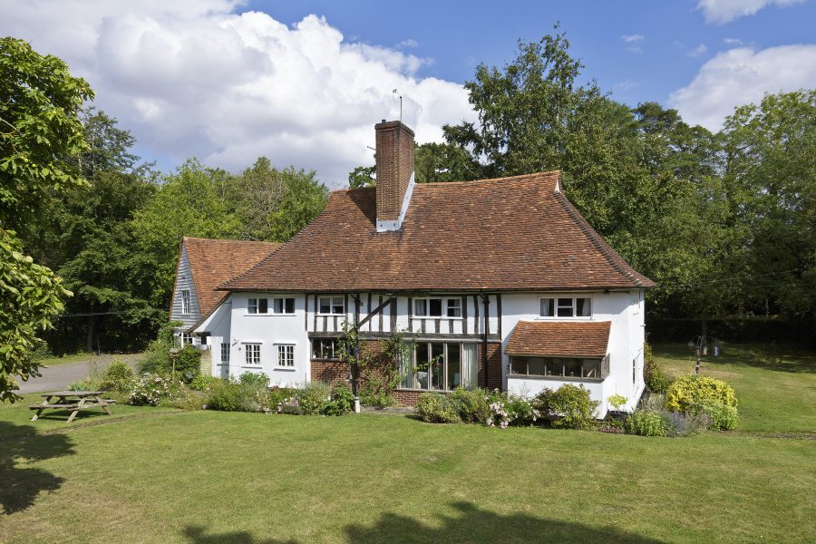 Alongside the land is a Grade ll listed four-bedroom property (Photo: Bidwells)