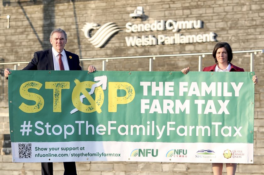 NFU Cymru president Aled Jones (L) said the IHT policy risked dismantling a vital sector