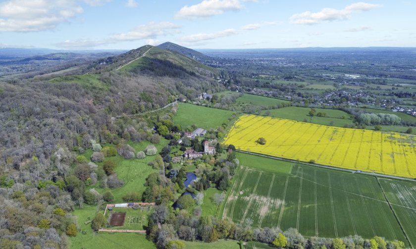 Little Malvern Court includes hundreds of acres of productive farmland